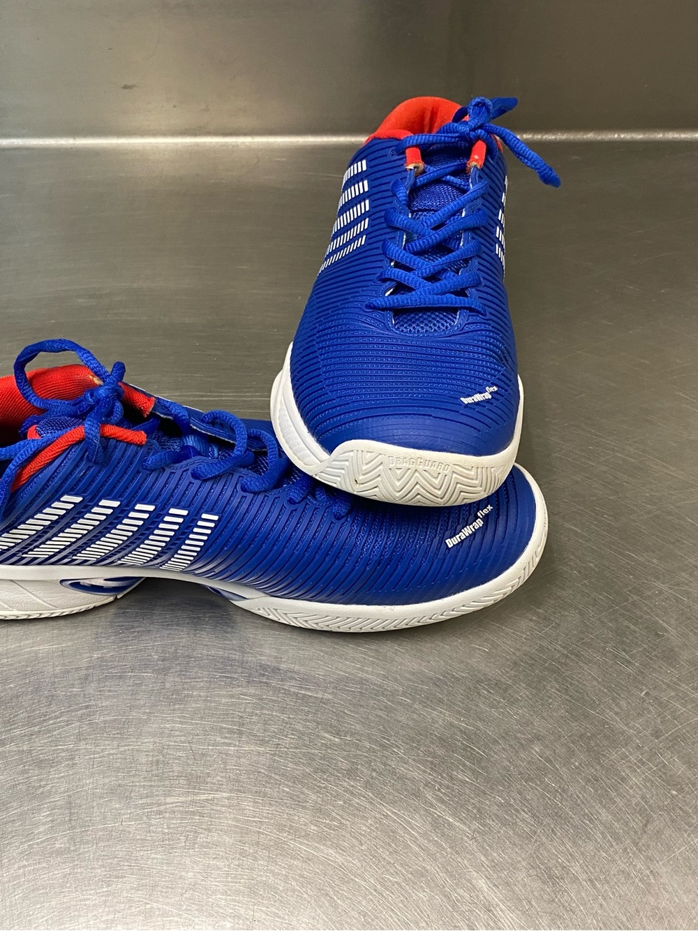 K-Swiss Blue Athletic Sneakers with Red Accents and White Sole